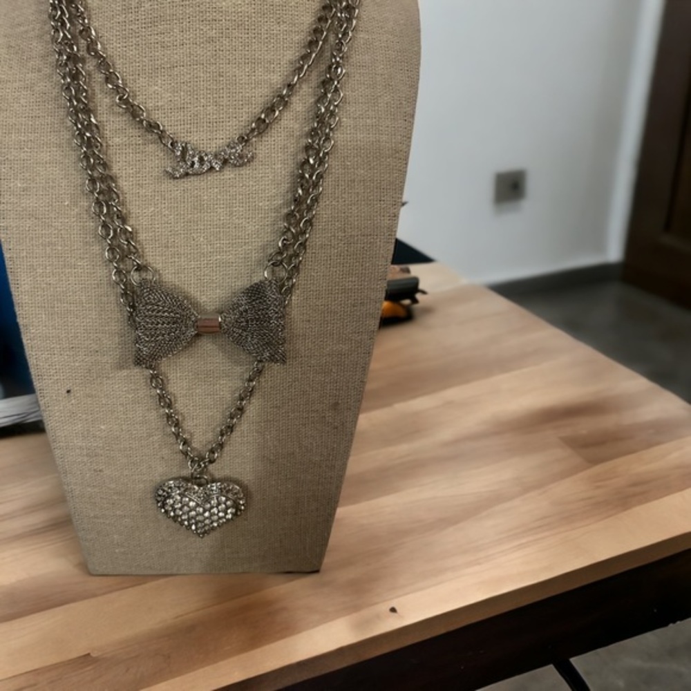 Super stylish, three tiered fashion necklace.